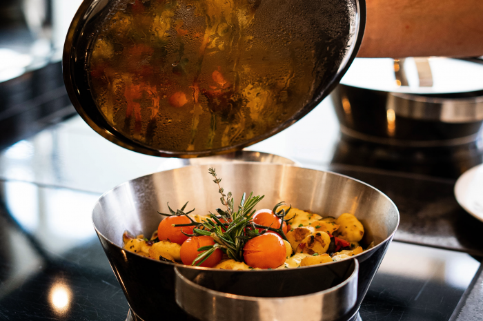 Hot pasta dish in saucepan